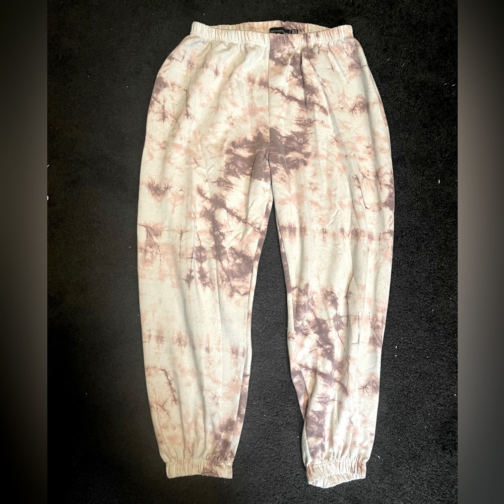 Super comfy, pink and white tie- dye sweatpants by Pretty Little Thing.